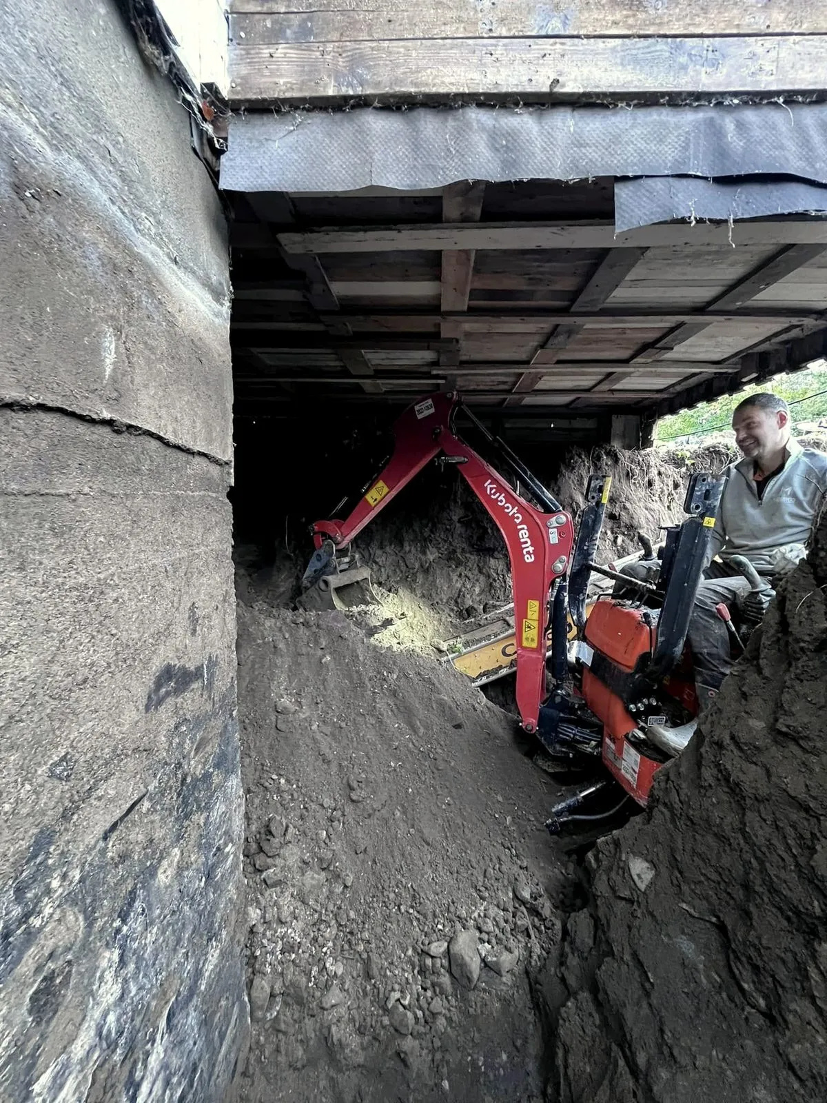 Minigraver under huset