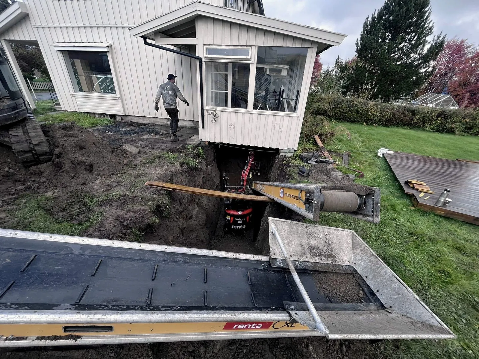 Transportbånd fra gropa ved huset